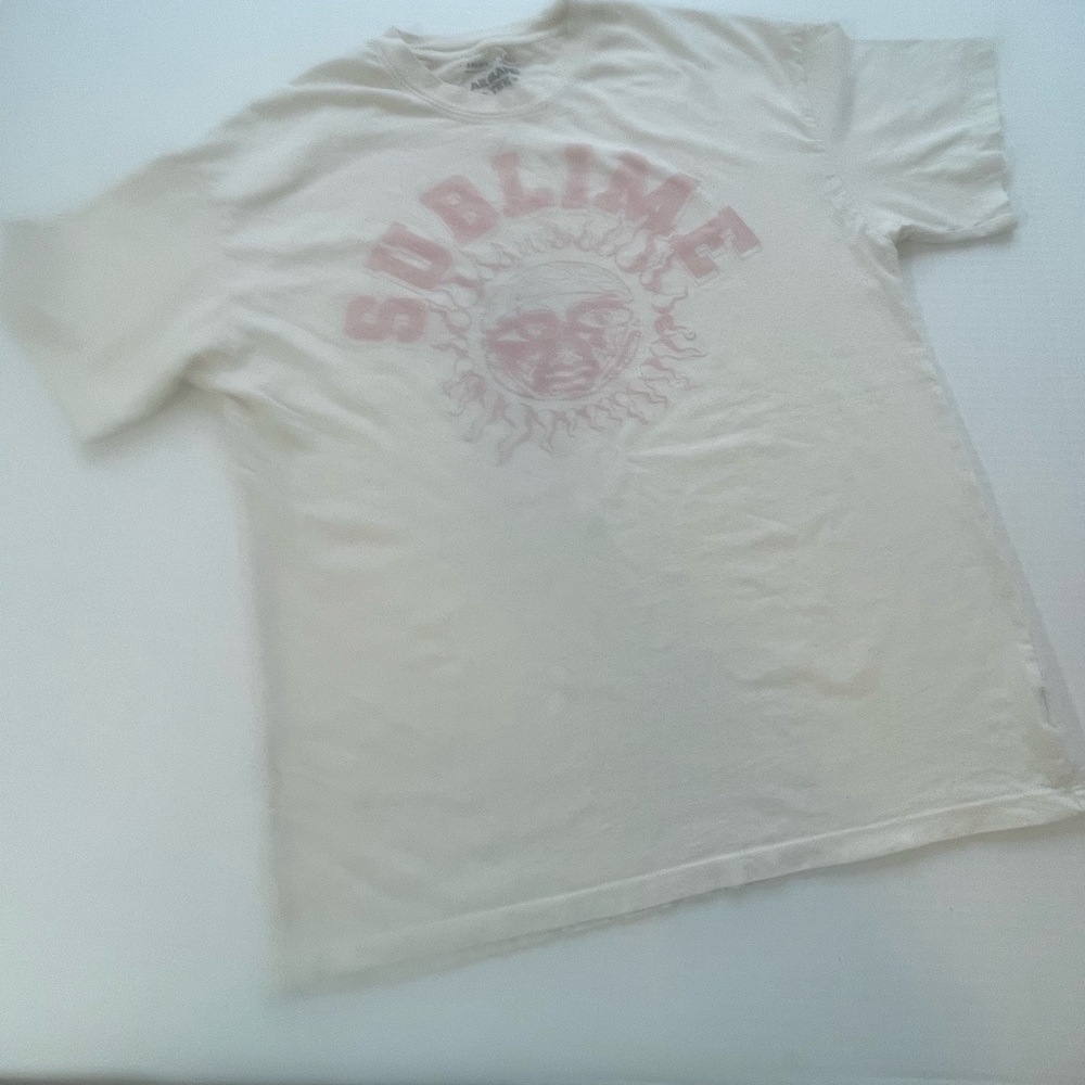 American Eagle Outfitters Cream Graphic Tee with Faded Pink Sublime Print